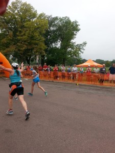 Crossing the Finish Line with my arms up in the air!